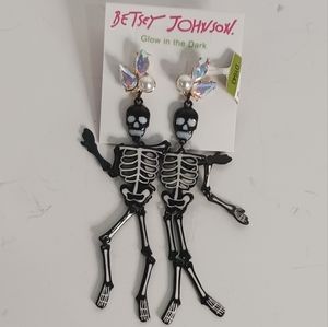 Black glow in the dark skeleton earrings
